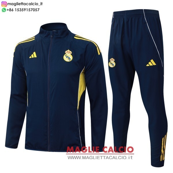 nuova real madrid insieme completo blu navy giallo giacca a vento 2025-2026